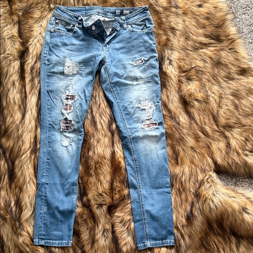 Distressed Blue Jeans